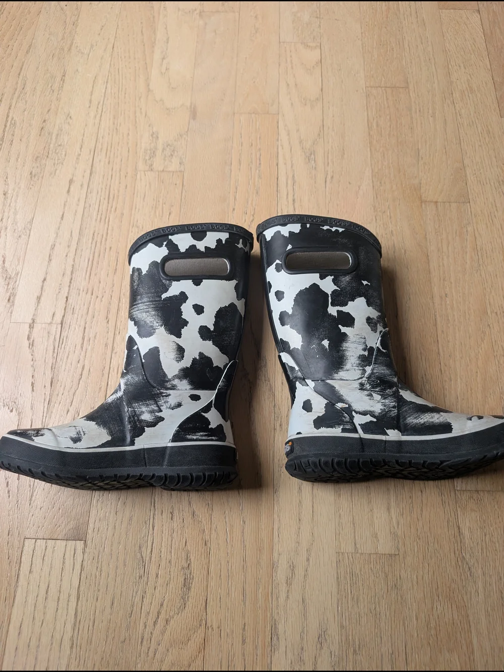 Bogs Kids Cow-Print Rain & Snow Boots in Black and White